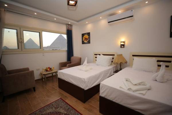 Habitación Triple con Vista a las Pirámides